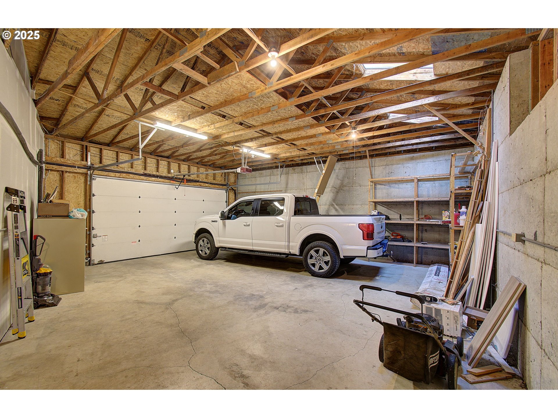 5911 Alki Road Vancouver, WA 98663 - Photo 28 of 29 a view of a car in garage