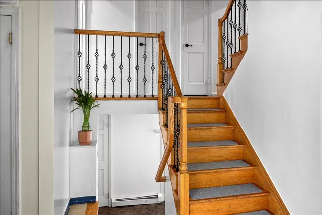 a view of entryway with wooden floor