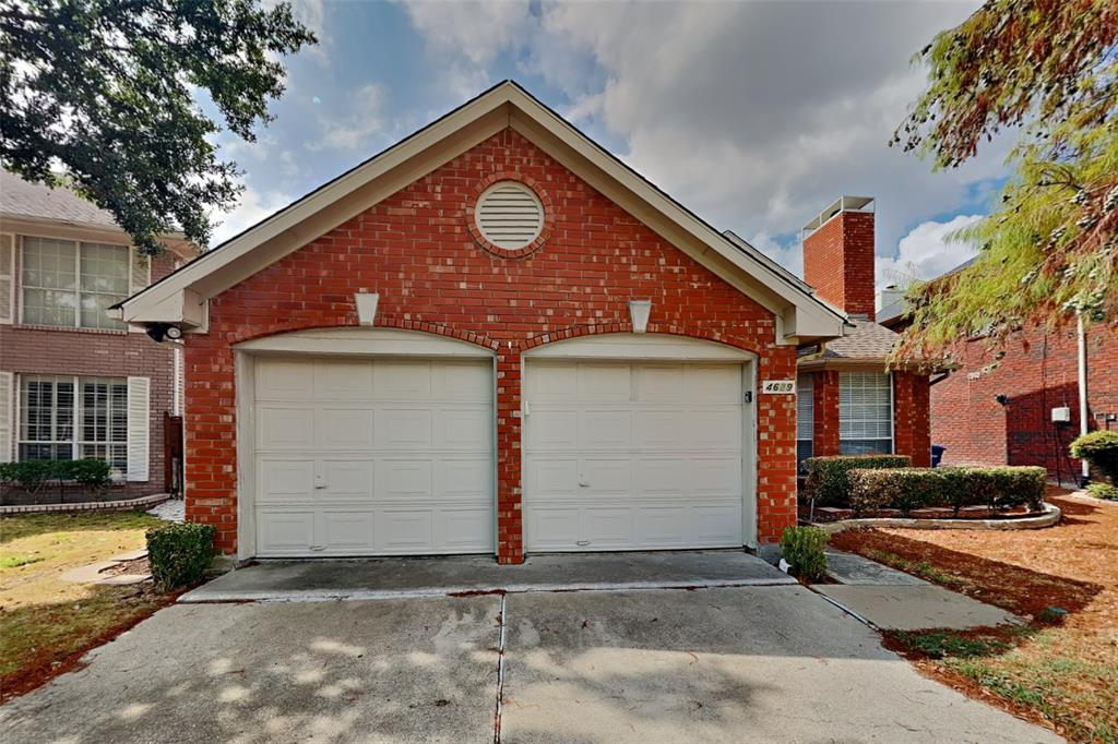 4629 Cherokee Path Carrollton, TX 75010 - Photo 1 of 1 a front view of a house with a yard