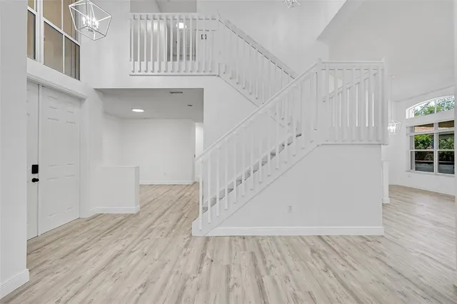 a view of entryway with wooden floor