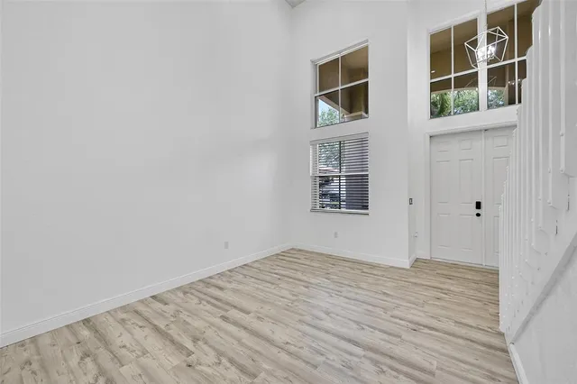 an empty room with windows