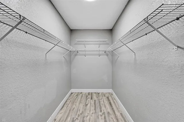 a view of a room with racks on the wall