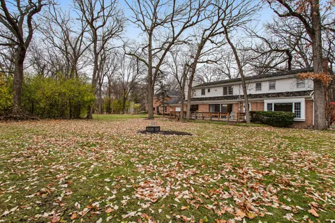 a view of a patio with a yard