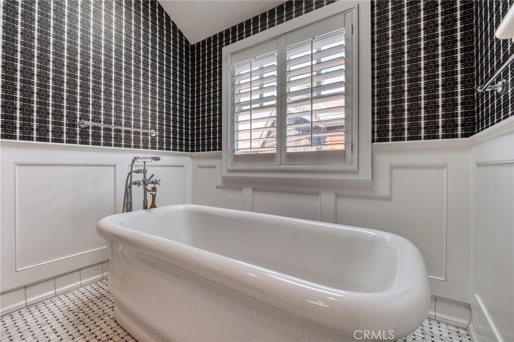 325 Poppy Avenue Corona del Mar, CA 92625 - Photo 13 of 22 a white bath tub sitting next to a window
