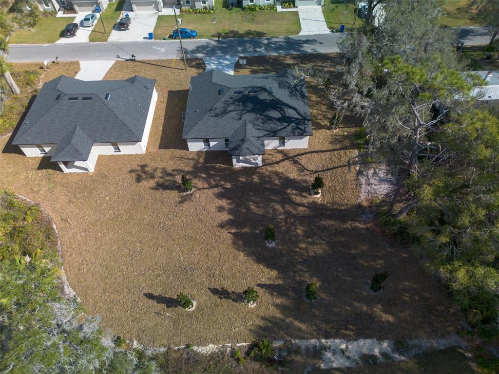 406 Ruby Avenue Deland, FL 32724 - Photo 19 of 23 an aerial view of residential houses with outdoor space