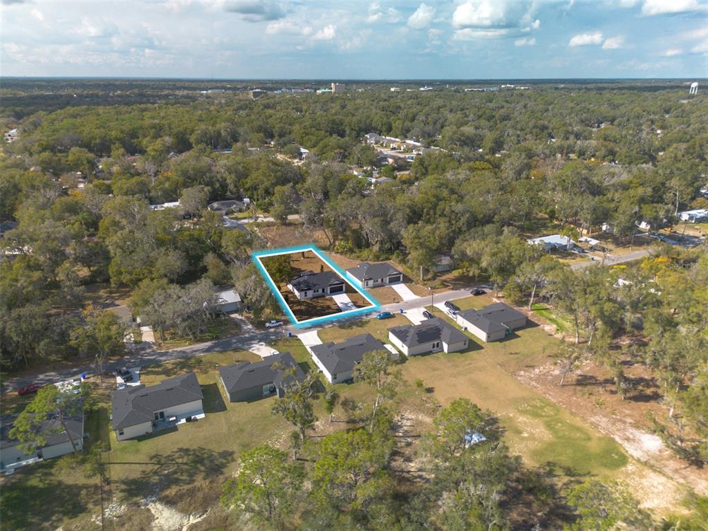 406 Ruby Avenue Deland, FL 32724 - Photo 23 of 23 an aerial view of residential houses with outdoor space