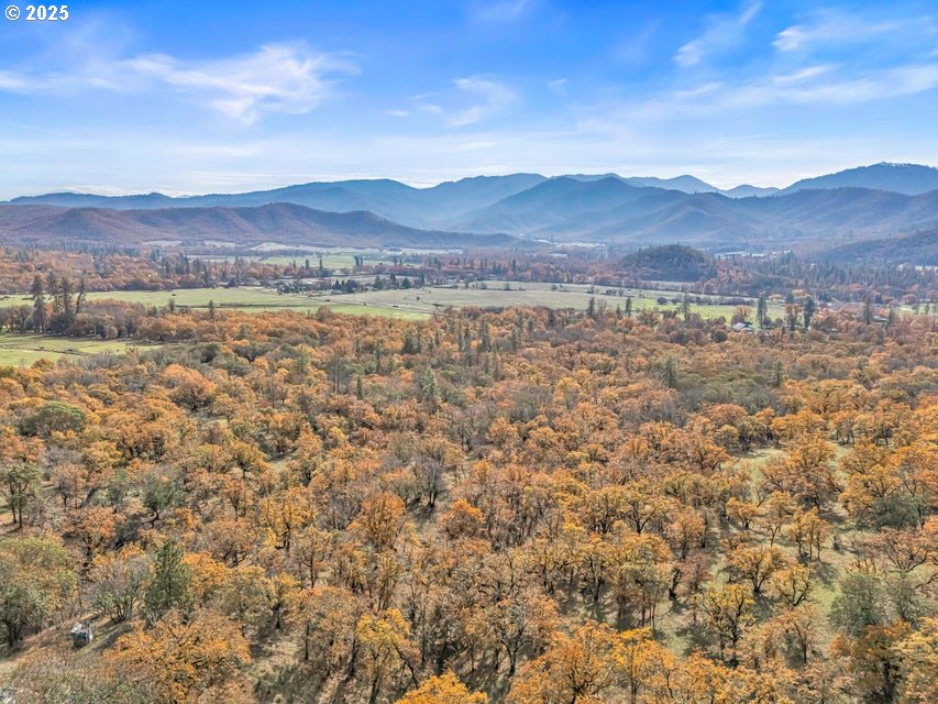 11926 Blackwell Road Central Point, OR 97502 - Photo 3 of 18 a view of lake and mountain