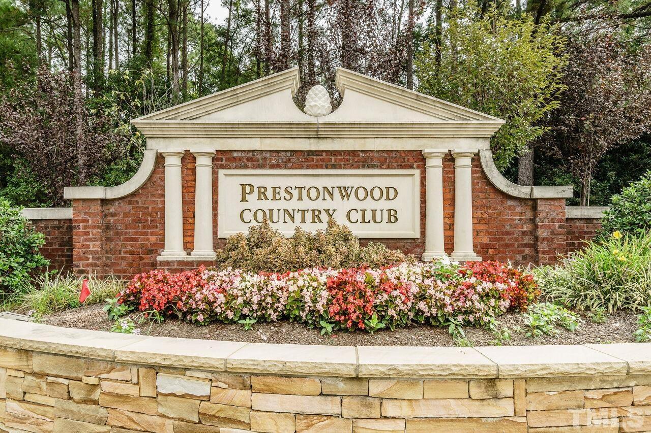 206 Firetree Lane Cary, NC 27513 - Photo 31 of 44 a sign on the side of a building