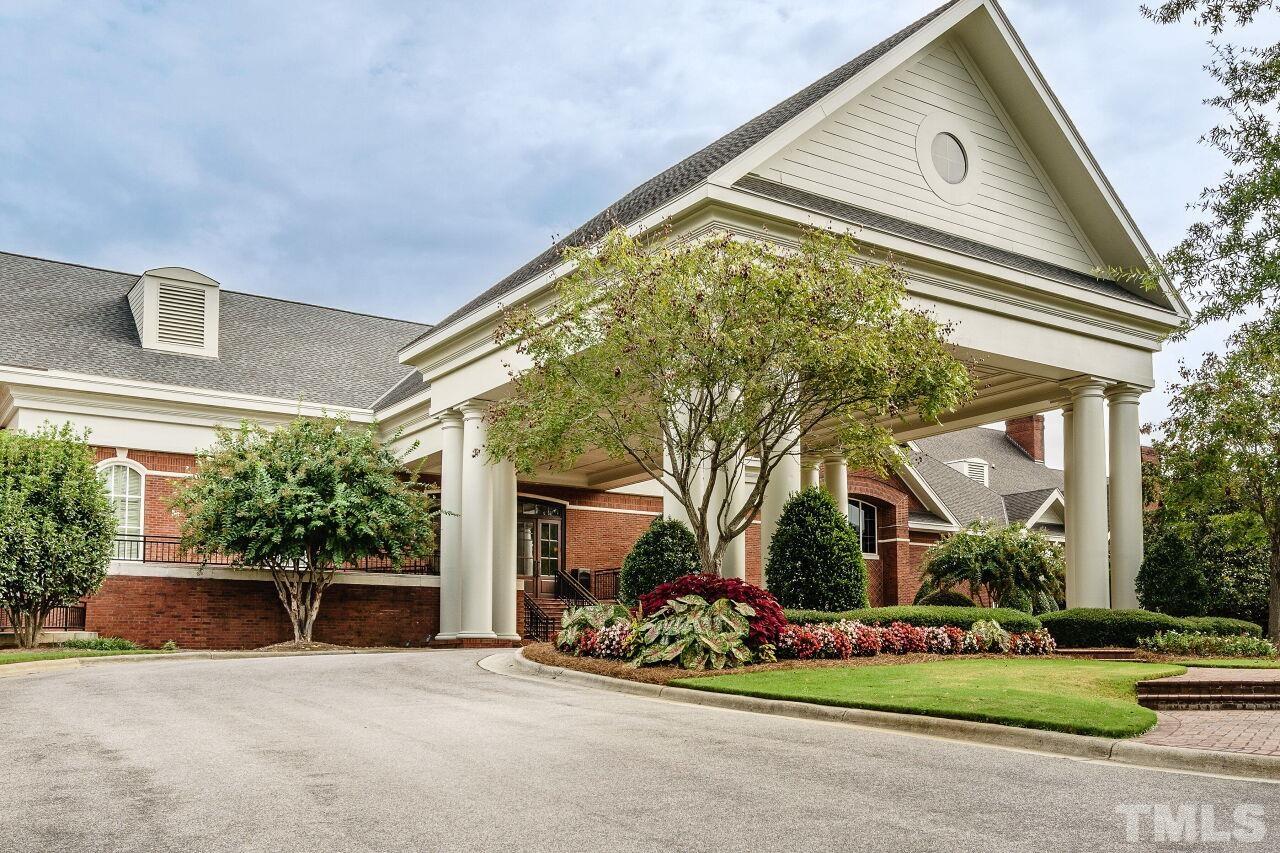 206 Firetree Lane Cary, NC 27513 - Photo 33 of 44 a front view of a house with a garden