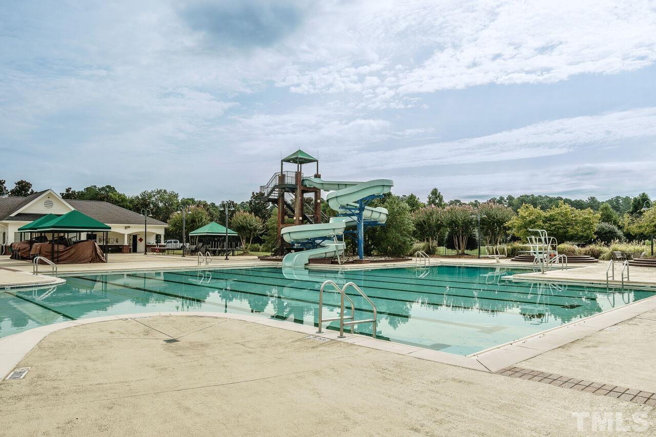 206 Firetree Lane Cary, NC 27513 - Photo 35 of 44 an outdoor view with a garden