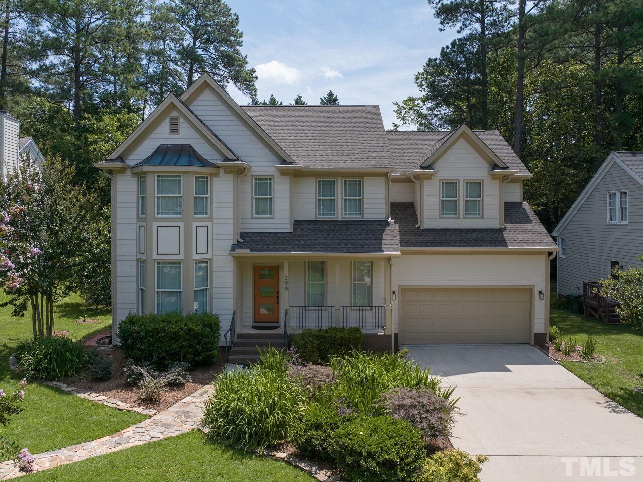 206 Firetree Lane Cary, NC 27513 - Photo 38 of 44 front view of a house with a yard
