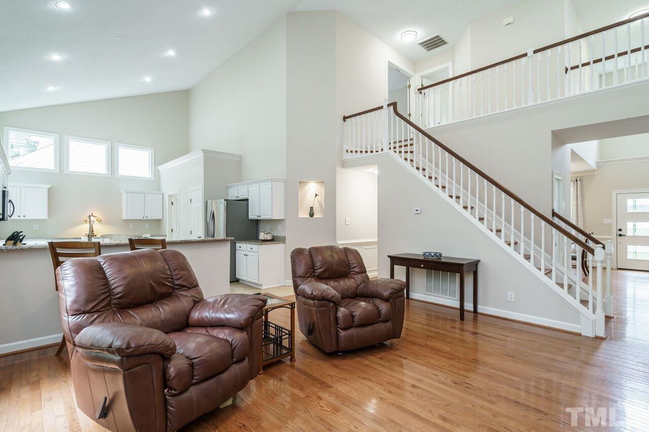 206 Firetree Lane Cary, NC 27513 - Photo 7 of 44 a living room with furniture and wooden floor