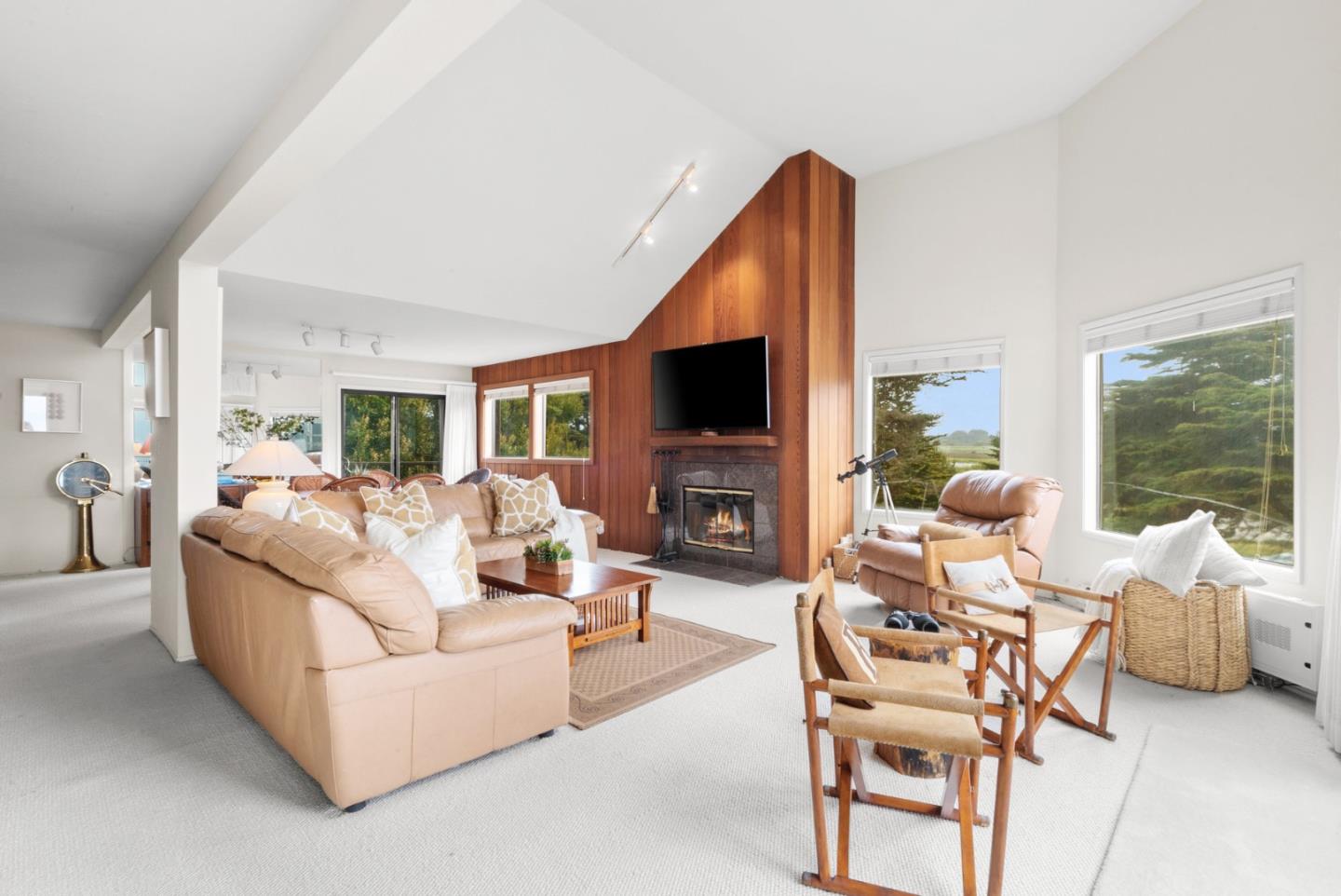 101 Shell Road, Unit 127 Watsonville, CA 95076 - Photo 15 of 54 a living room with furniture a large window and a flat screen tv