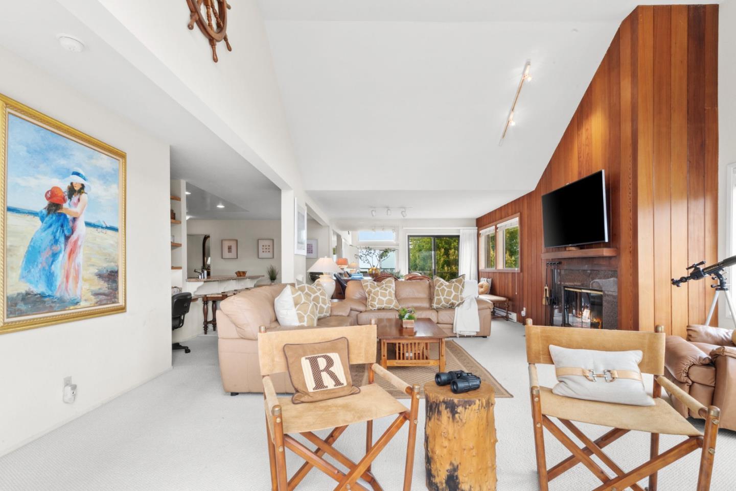 101 Shell Road, Unit 127 Watsonville, CA 95076 - Photo 16 of 54 a living room with fireplace furniture and a flat screen tv