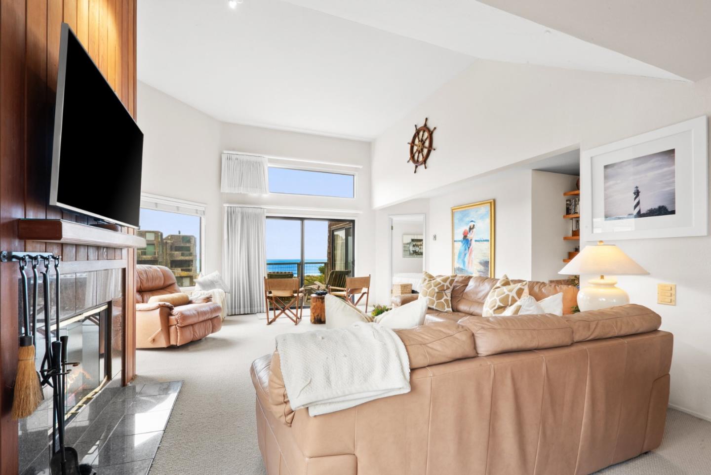 101 Shell Road, Unit 127 Watsonville, CA 95076 - Photo 17 of 54 a living room with furniture and a flat screen tv