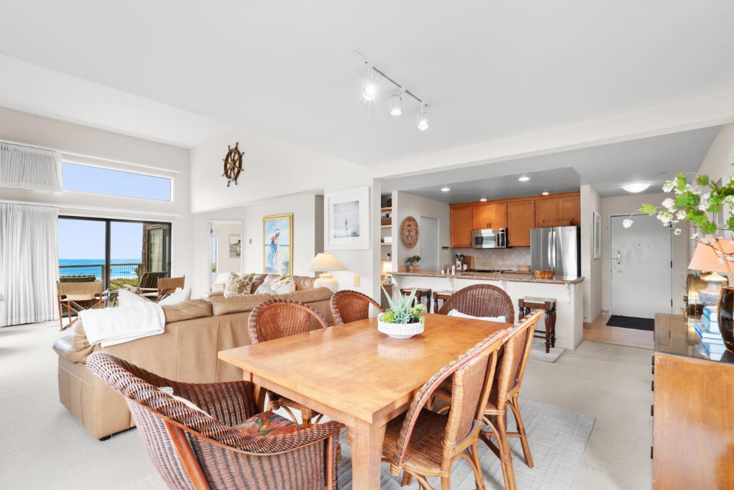 101 Shell Road, Unit 127 Watsonville, CA 95076 - Photo 18 of 54 a dining room with furniture a livingroom and chandelier