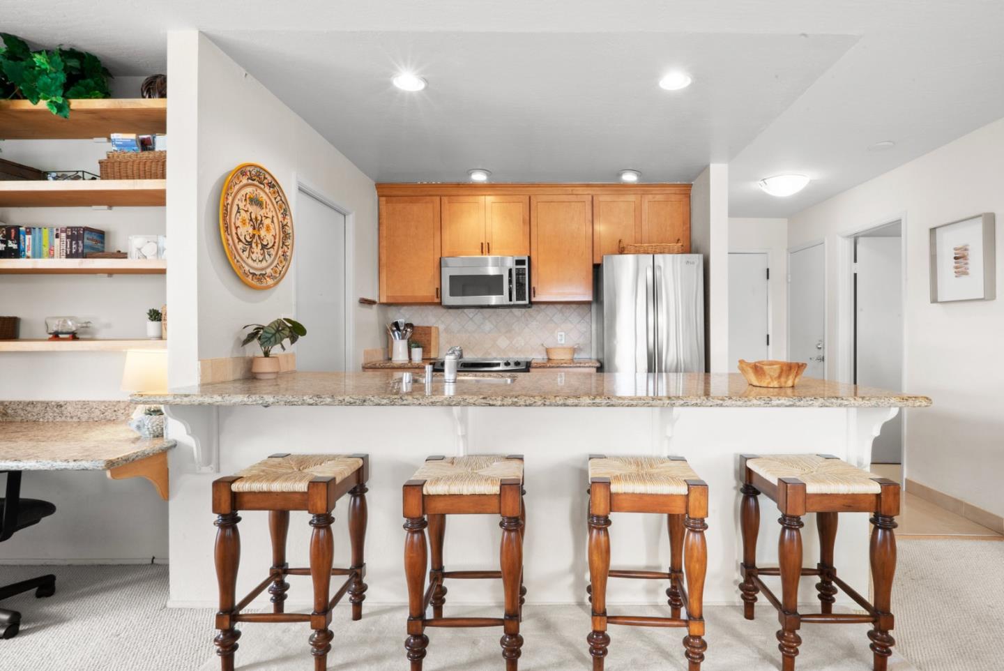 101 Shell Road, Unit 127 Watsonville, CA 95076 - Photo 20 of 54 a large kitchen with a table and chairs in it