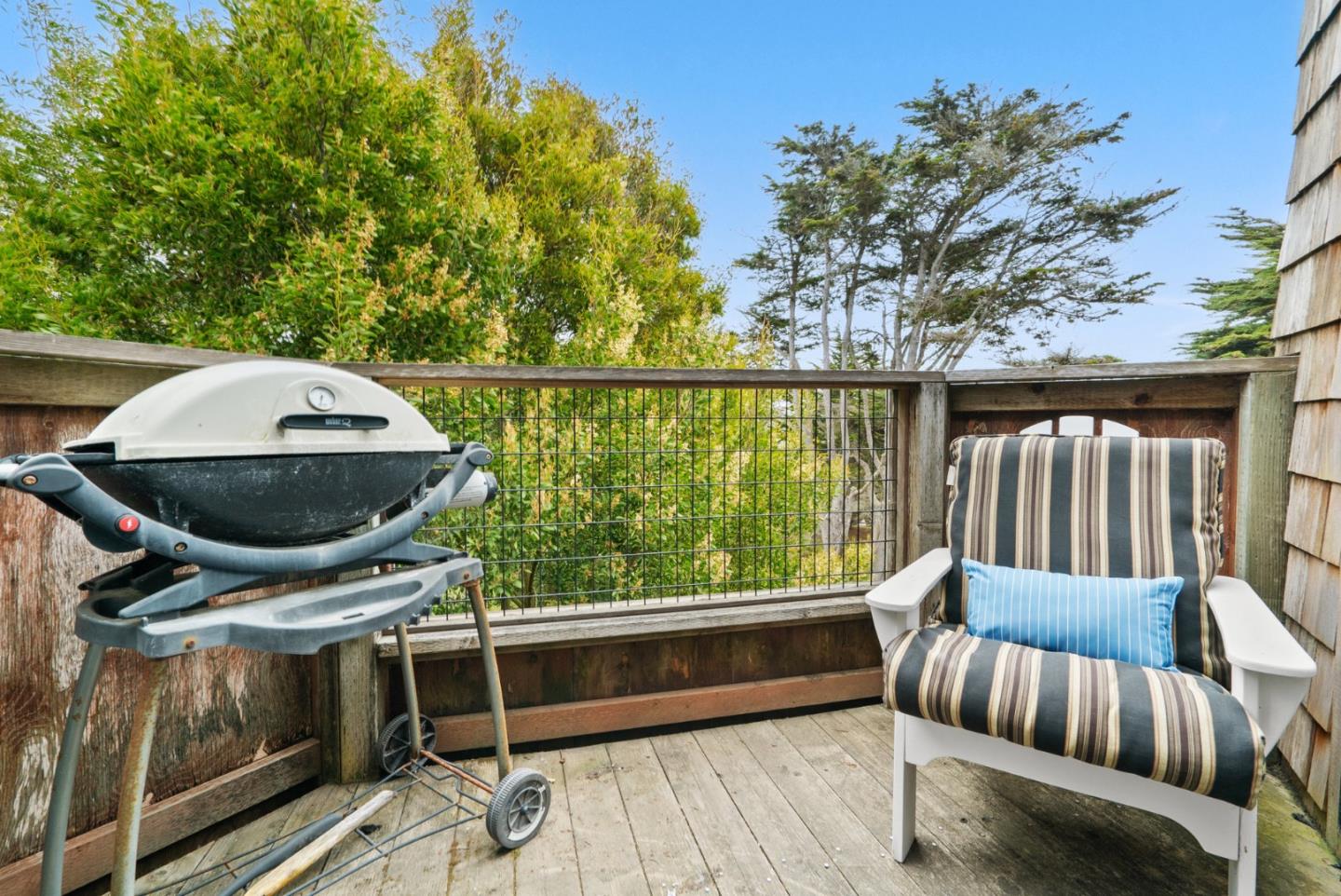 101 Shell Road, Unit 127 Watsonville, CA 95076 - Photo 29 of 54 a view of balcony with wooden floor and outdoor seating