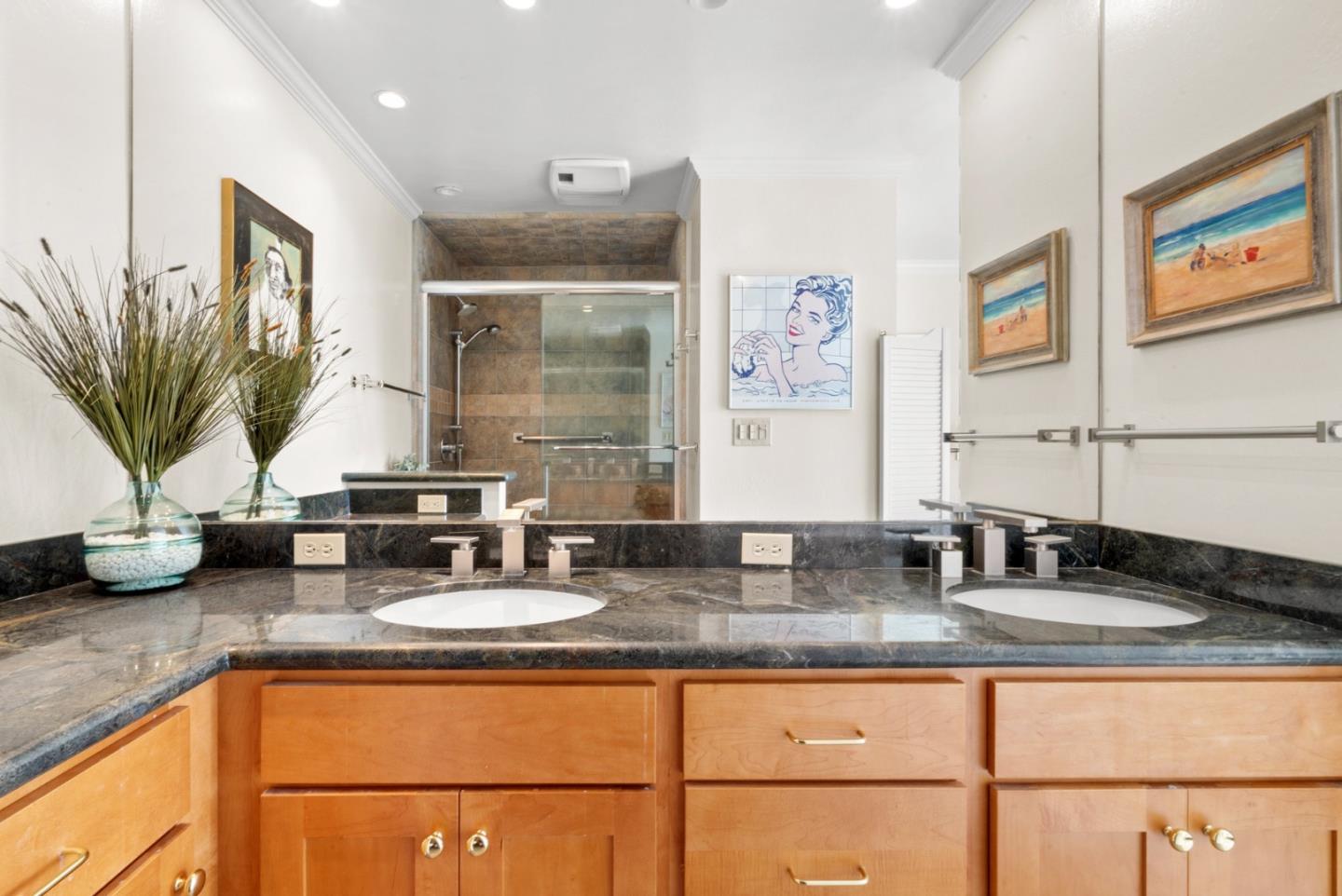 101 Shell Road, Unit 127 Watsonville, CA 95076 - Photo 39 of 54 a kitchen with granite countertop a sink and a counter top space