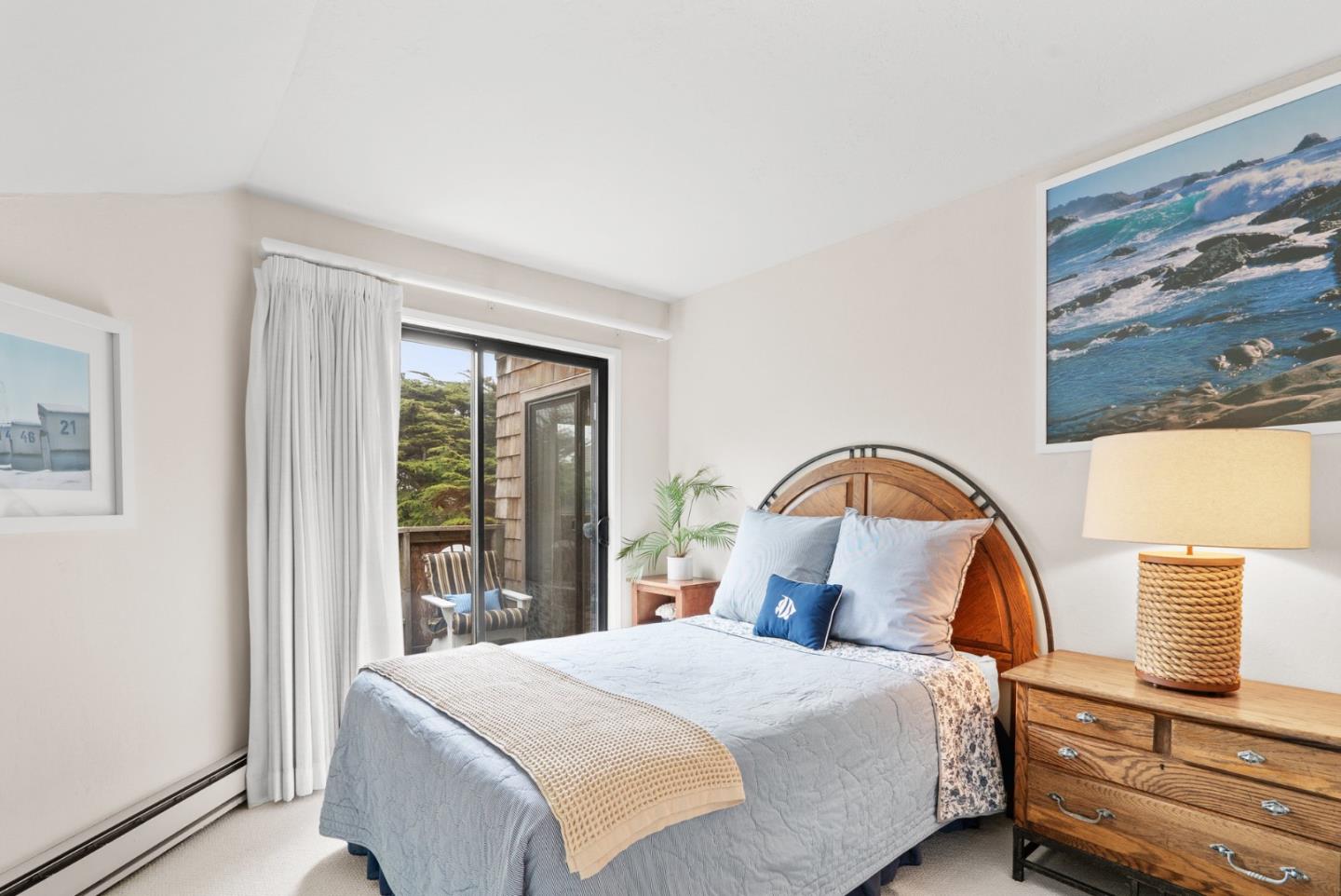 101 Shell Road, Unit 127 Watsonville, CA 95076 - Photo 42 of 54 a bedroom with a bed and a large window