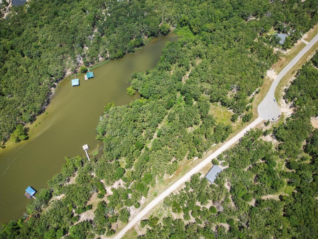 6658 Nautical Drive Quinlan, TX 75474 - Photo 14 of 27 Drone / aerial view featuring a water view