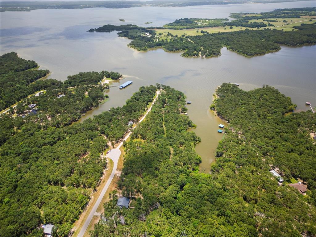 6658 Nautical Drive Quinlan, TX 75474 - Photo 19 of 27 Birds eye view of property featuring a water view