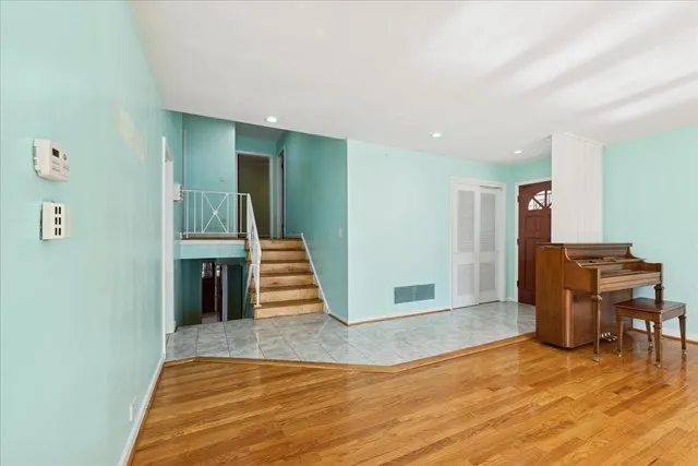 a view of livingroom with furniture and workspace