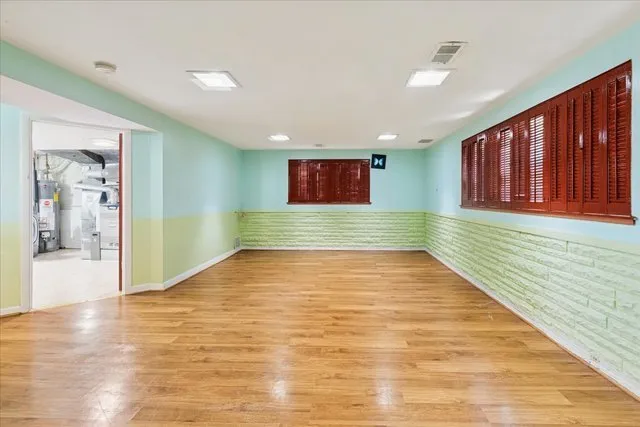 a view of a livingroom with wooden floor