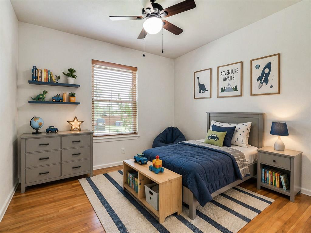 2315 Inadale Avenue Dallas, TX 75228 - Photo 25 of 36 a bedroom with a bed and a window