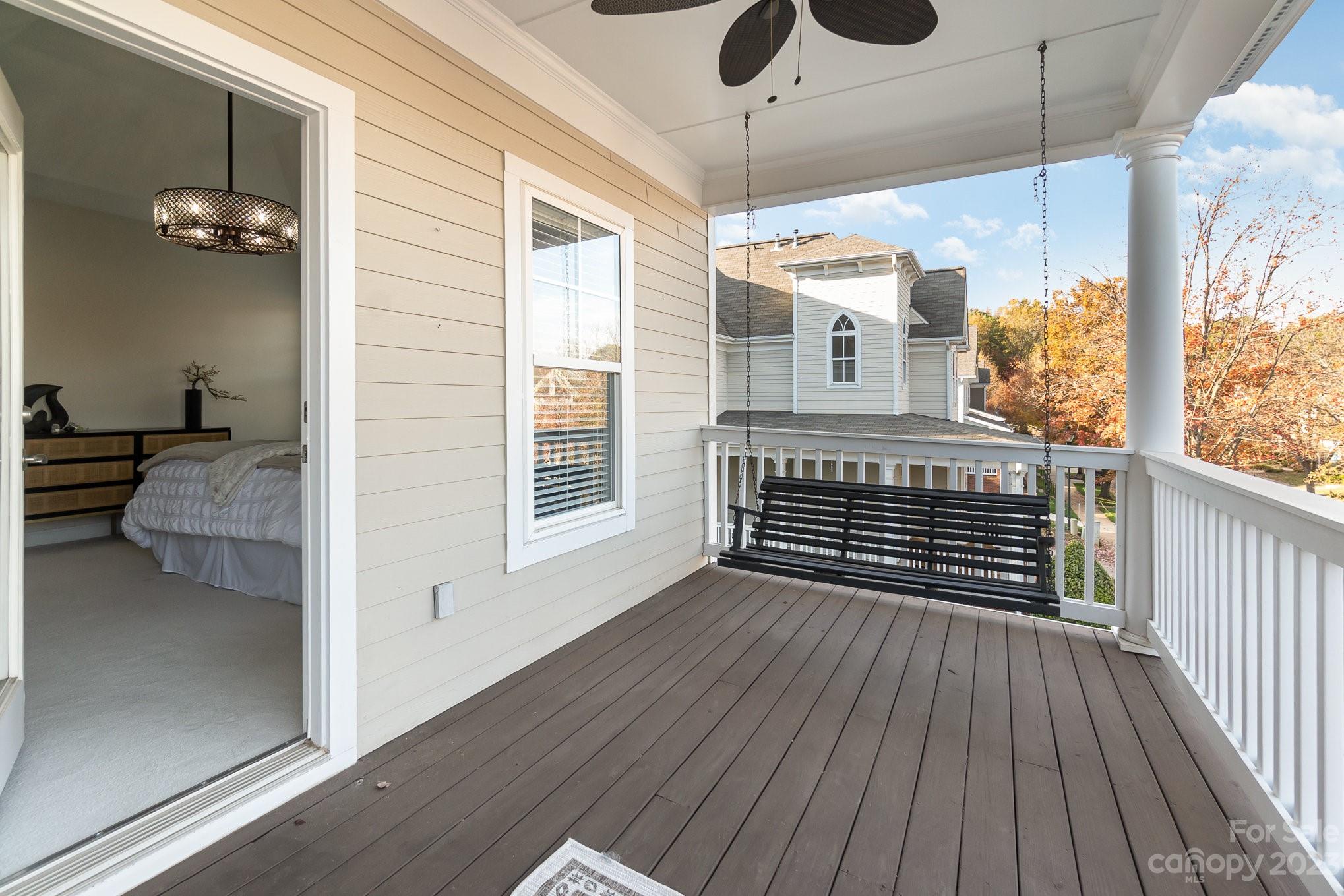 8128 Townley Road Huntersville, NC 28078 - Photo 15 of 20 a view of a balcony with wooden floor