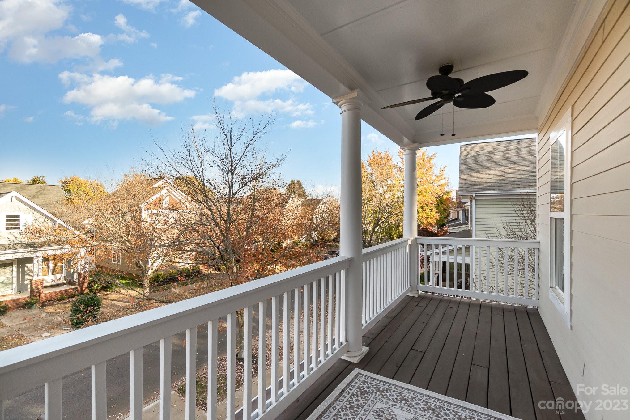 8128 Townley Road Huntersville, NC 28078 - Photo 16 of 20 a view of a balcony with wooden floor