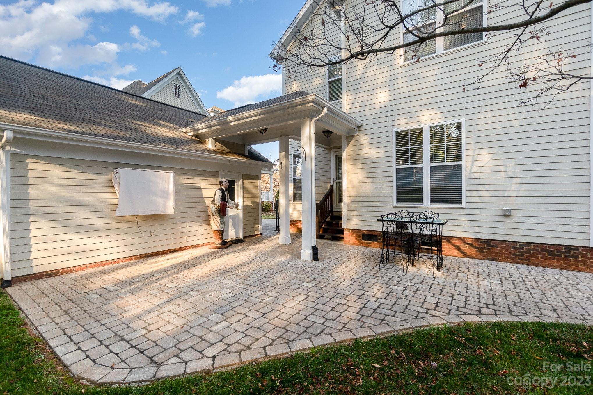 8128 Townley Road Huntersville, NC 28078 - Photo 20 of 20 a view of a porch with a table and chairs