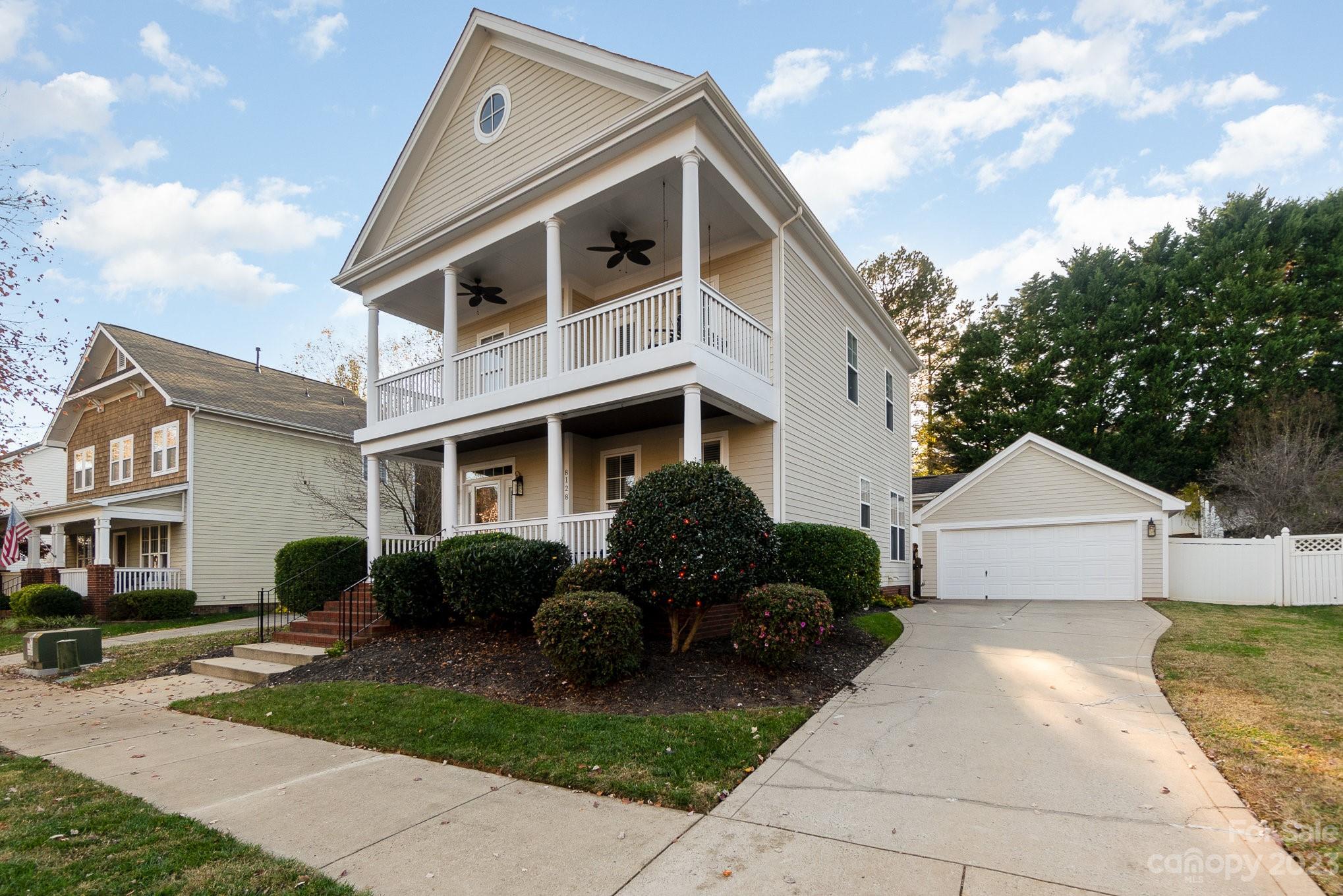 8128 Townley Road Huntersville, NC 28078 - Photo 2 of 20 a front view of a house with a yard