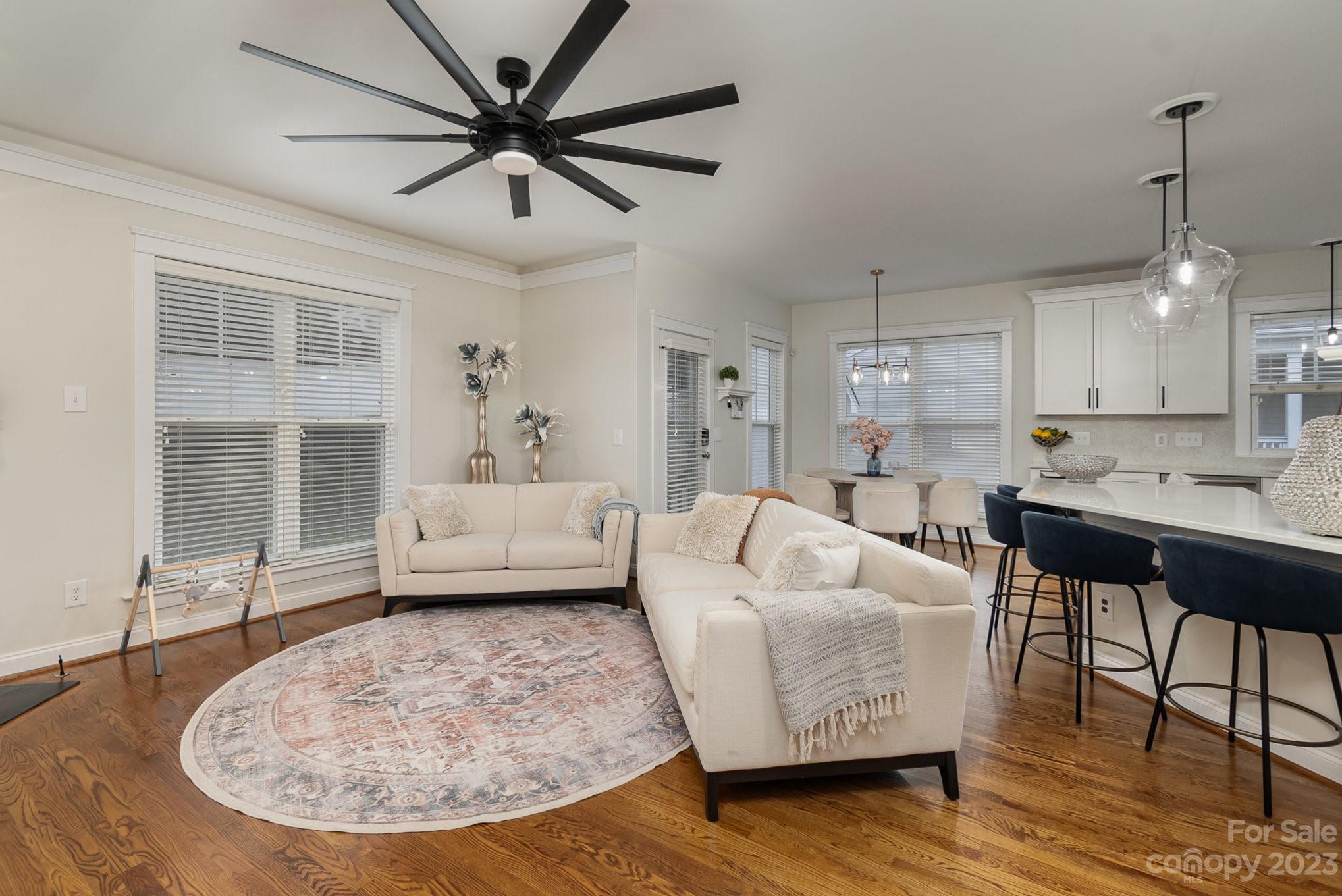 8128 Townley Road Huntersville, NC 28078 - Photo 6 of 20 a living room with furniture and a large window