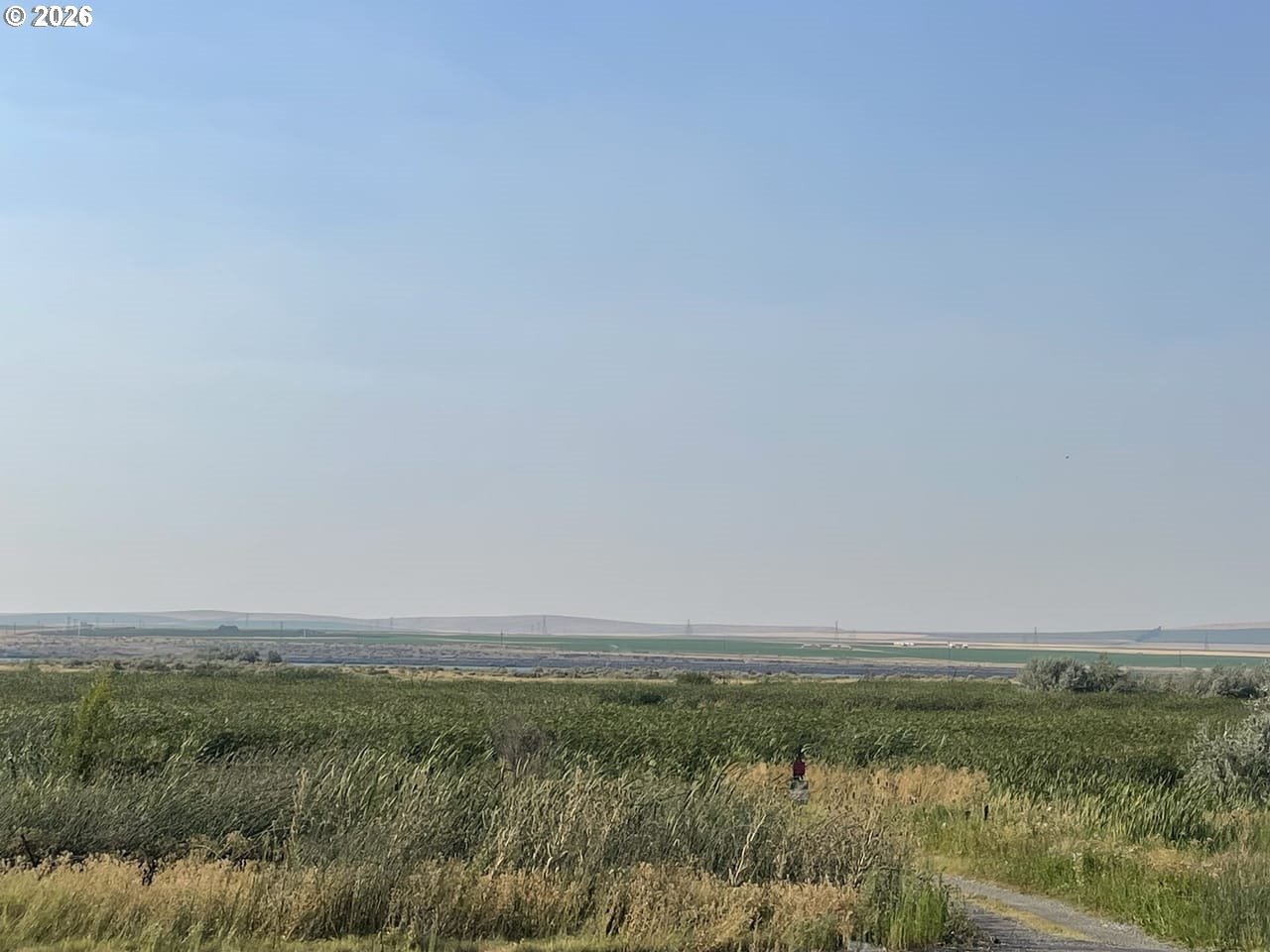 3 Parcels Highway Irrigon, OR 97844 - Photo 8 of 10 a view of a field with an ocean beach