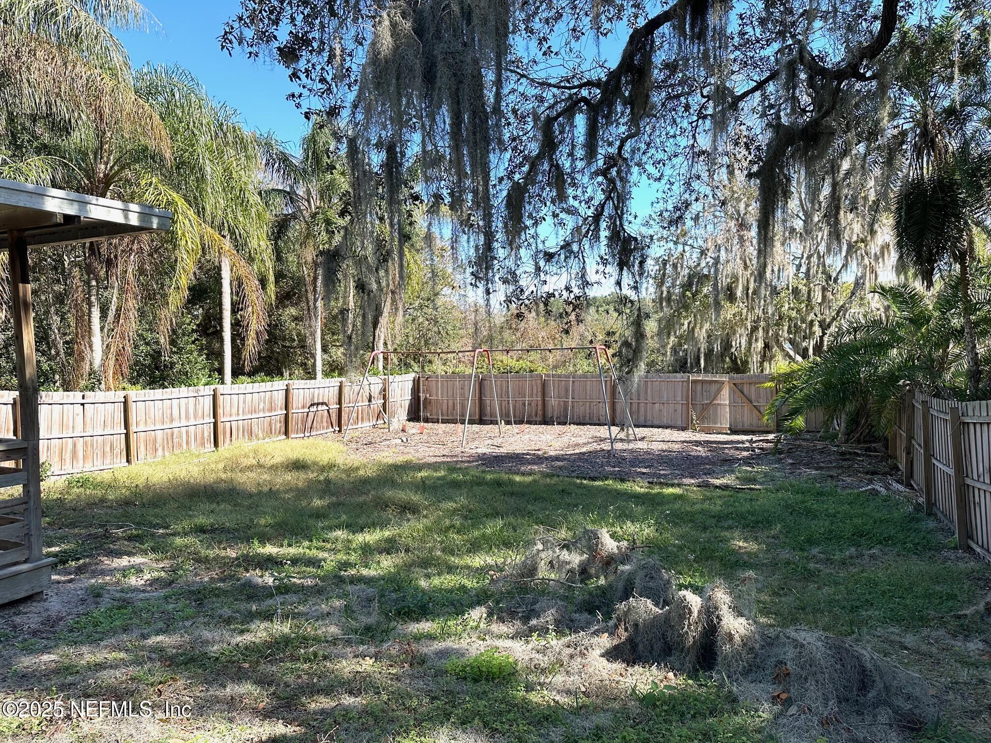 27734 Lake Jem Road Mount Dora, FL 32757 - Photo 4 of 19 a view of a park with large trees