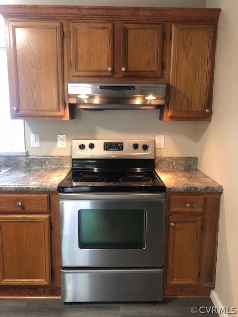 6612 Davis Road Quinton, VA 23141 - Photo 12 of 37 The kitchen has a stainless range and vent.