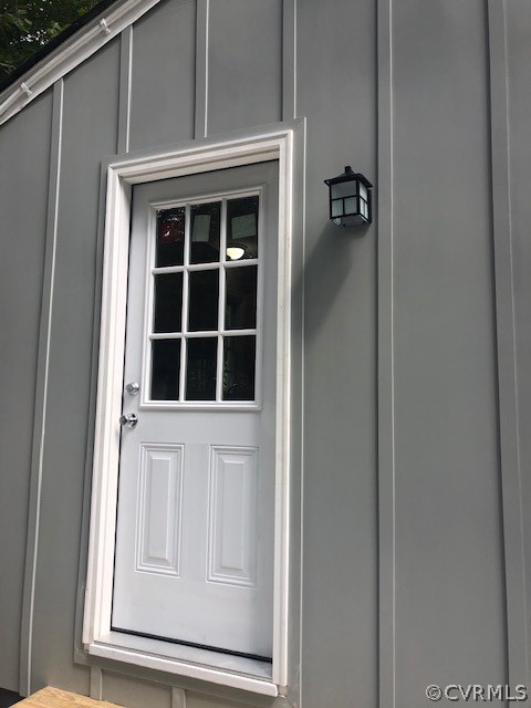 6612 Davis Road Quinton, VA 23141 - Photo 22 of 37 New exterior light, door and siding on the side en