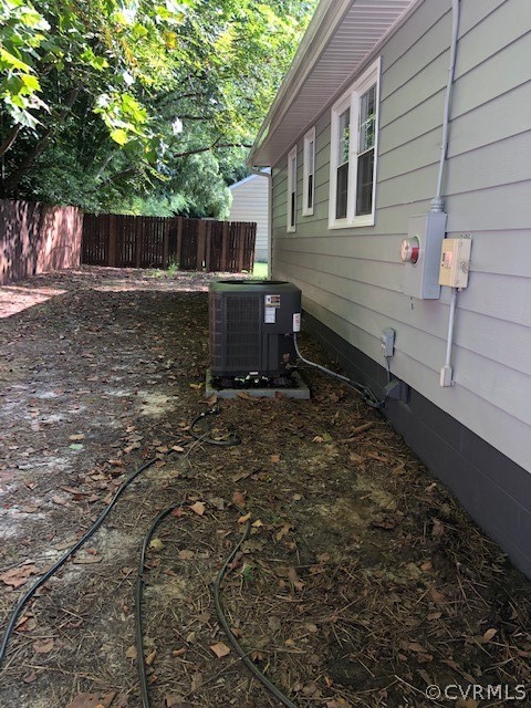 6612 Davis Road Quinton, VA 23141 - Photo 25 of 37 The level back yard you see the new HVAC unit and