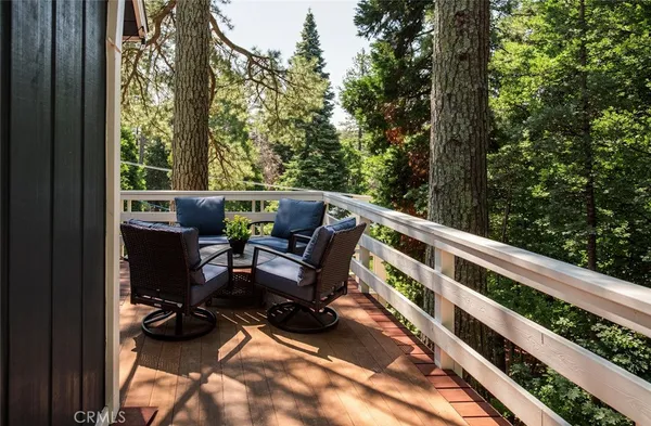 a view of balcony with furniture