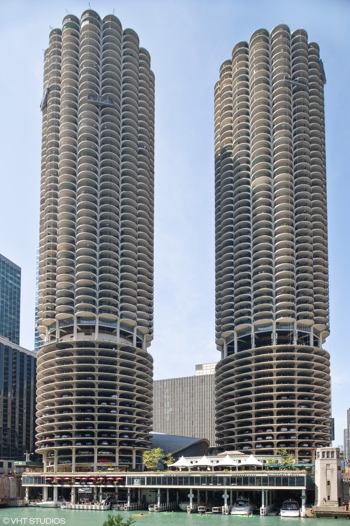 300 North State Street, Unit 4728 Chicago, IL 60654 - Photo 1 of 12 a view of a building with tall windows