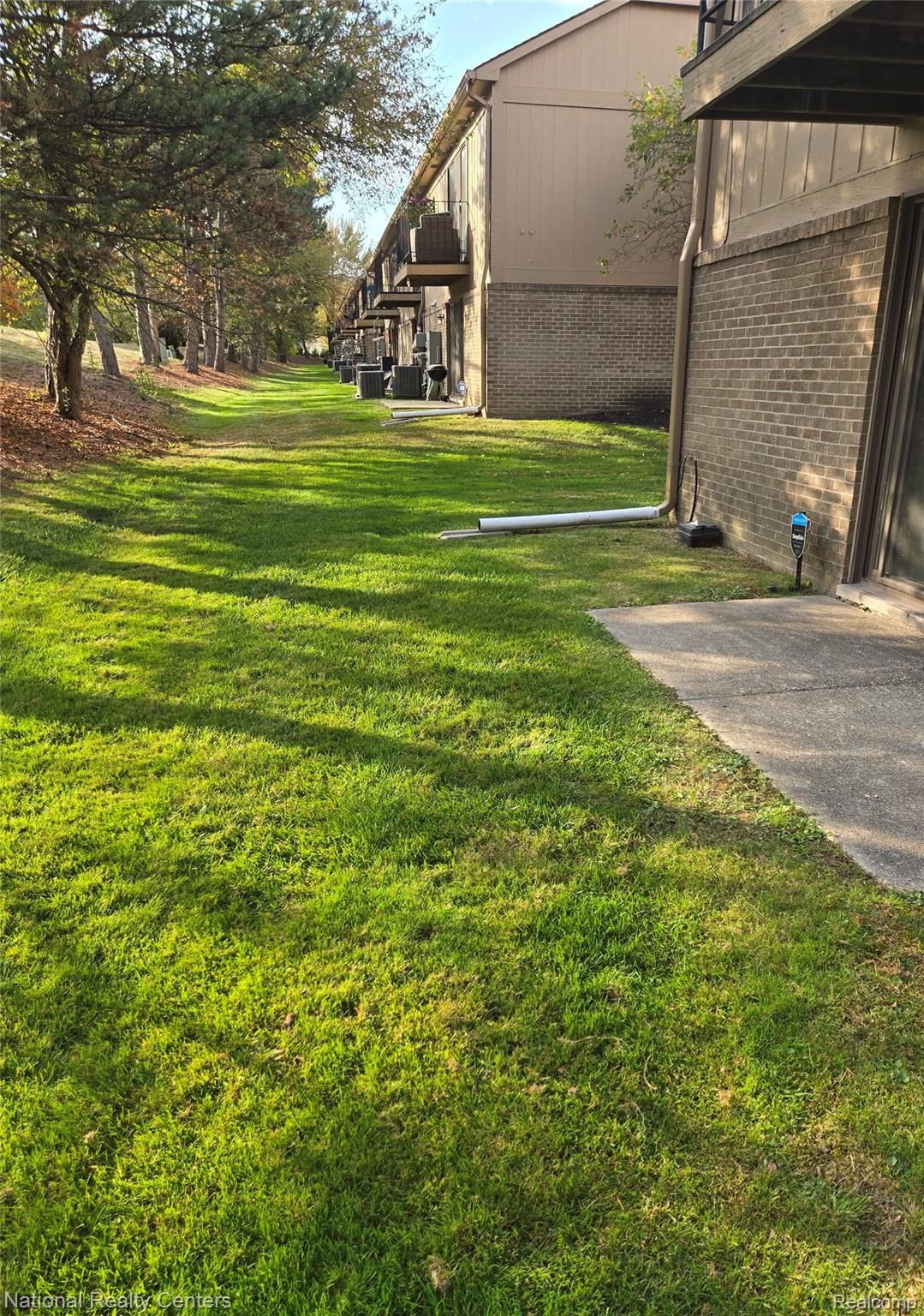 27354 Evergreen Road Southfield, MI 48076 - Photo 13 of 13 View of grassy yard featuring a patio, great area for grilling.