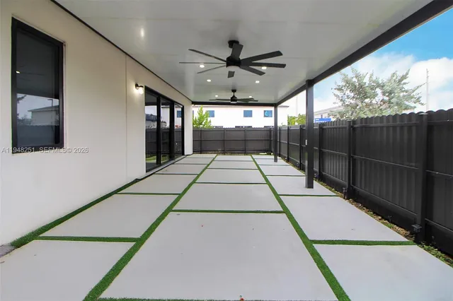 a view of an entryway with hallway