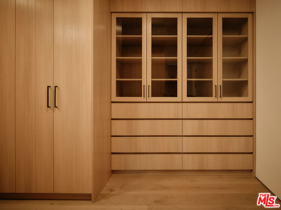 8899 Beverly Boulevard, Unit 8C Los Angeles, CA 90048 - Photo 20 of 33 a view of a house with a large window