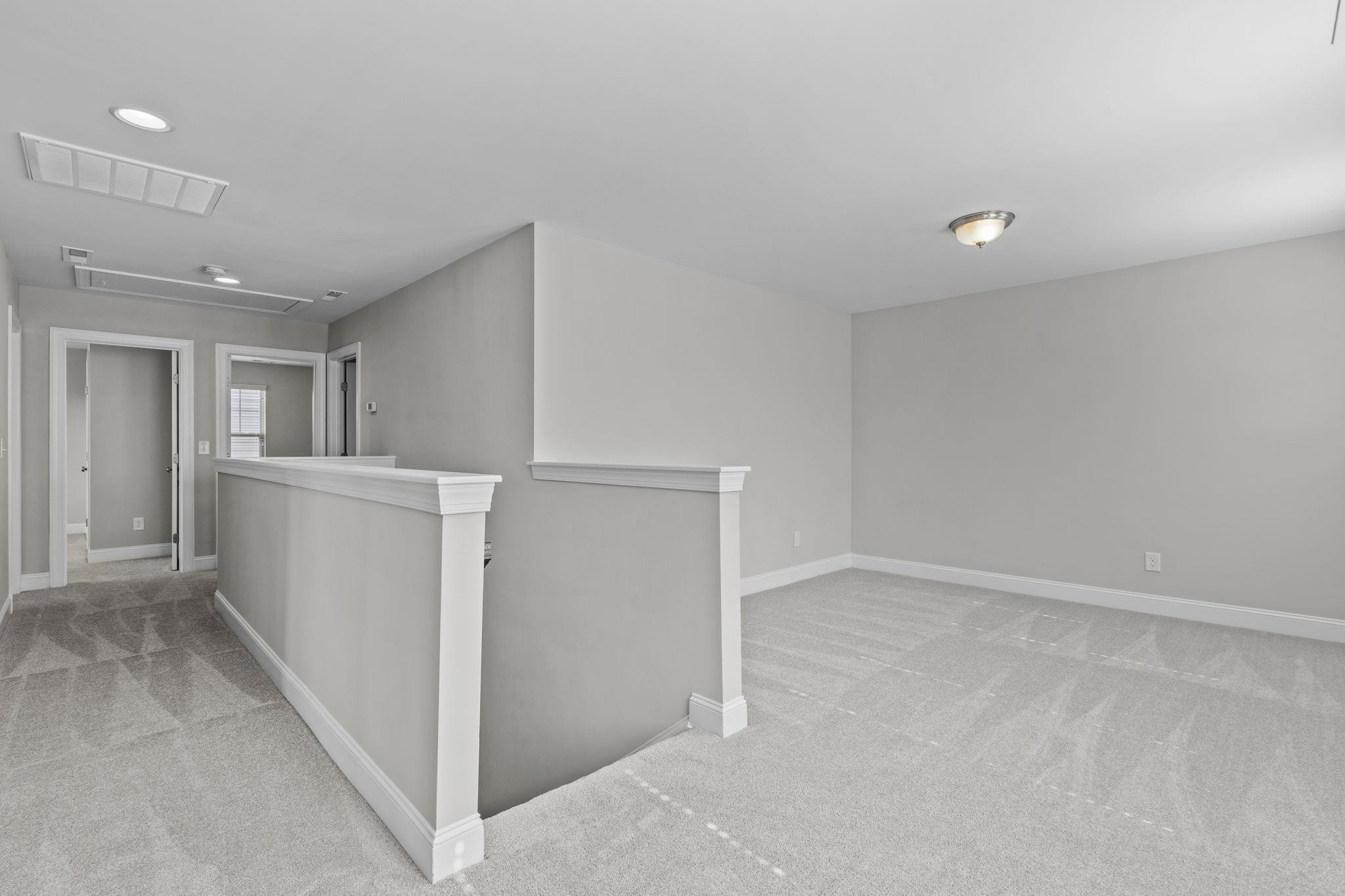 4240 Rockdell Hall Street Raleigh, NC 27616 - Photo 21 of 39 an empty room with a bathroom