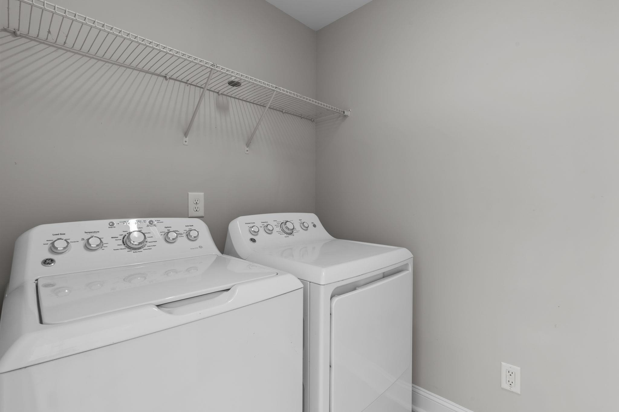 4240 Rockdell Hall Street Raleigh, NC 27616 - Photo 24 of 39 a utility room with dryer and washer