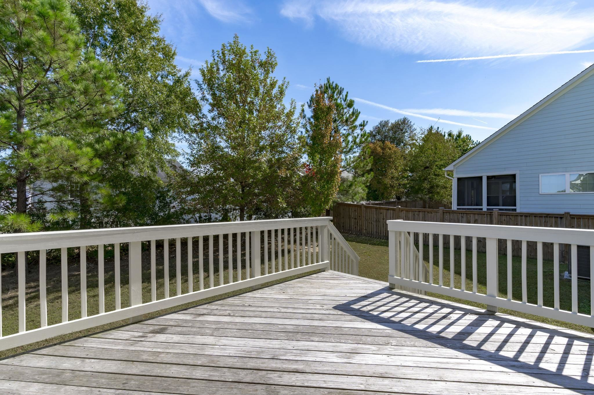 4240 Rockdell Hall Street Raleigh, NC 27616 - Photo 37 of 39 a view of a wooden roof deck