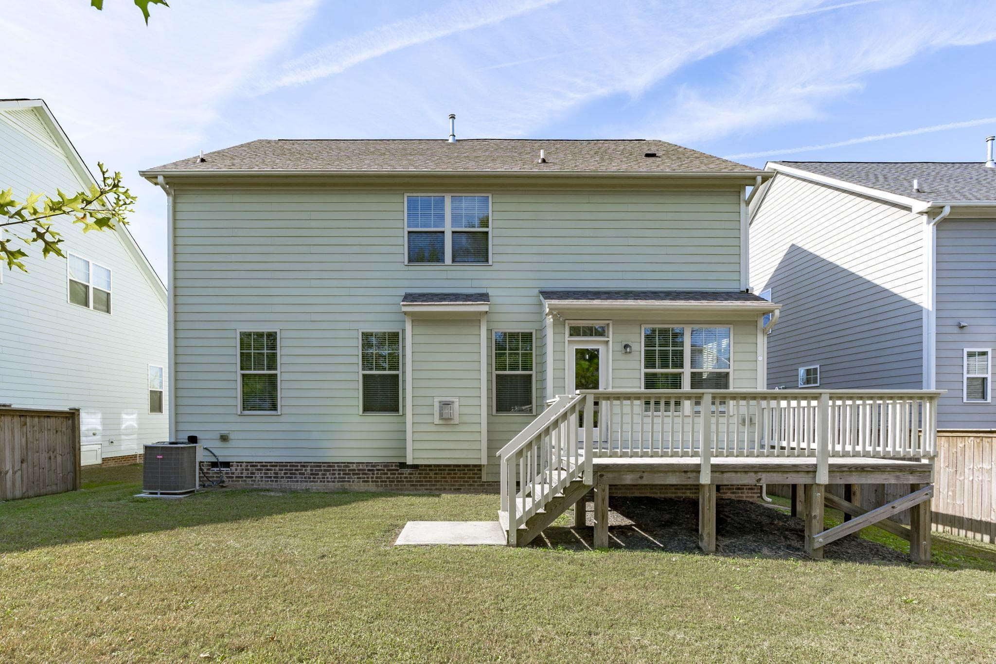 4240 Rockdell Hall Street Raleigh, NC 27616 - Photo 39 of 39 a front view of a house with a garden and furniture
