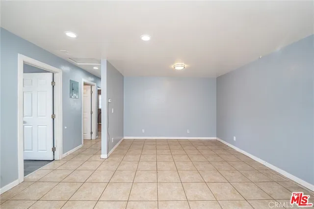 a view of an empty room and window