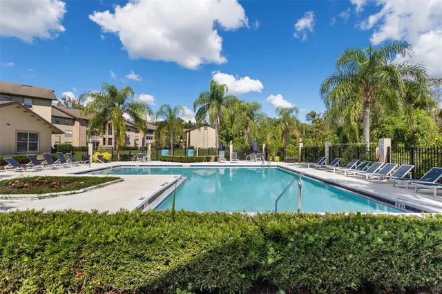 a view of a swimming pool with outdoor space